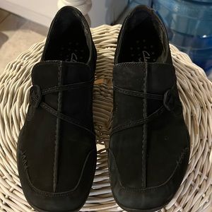 Clarks black suede slip on’s
